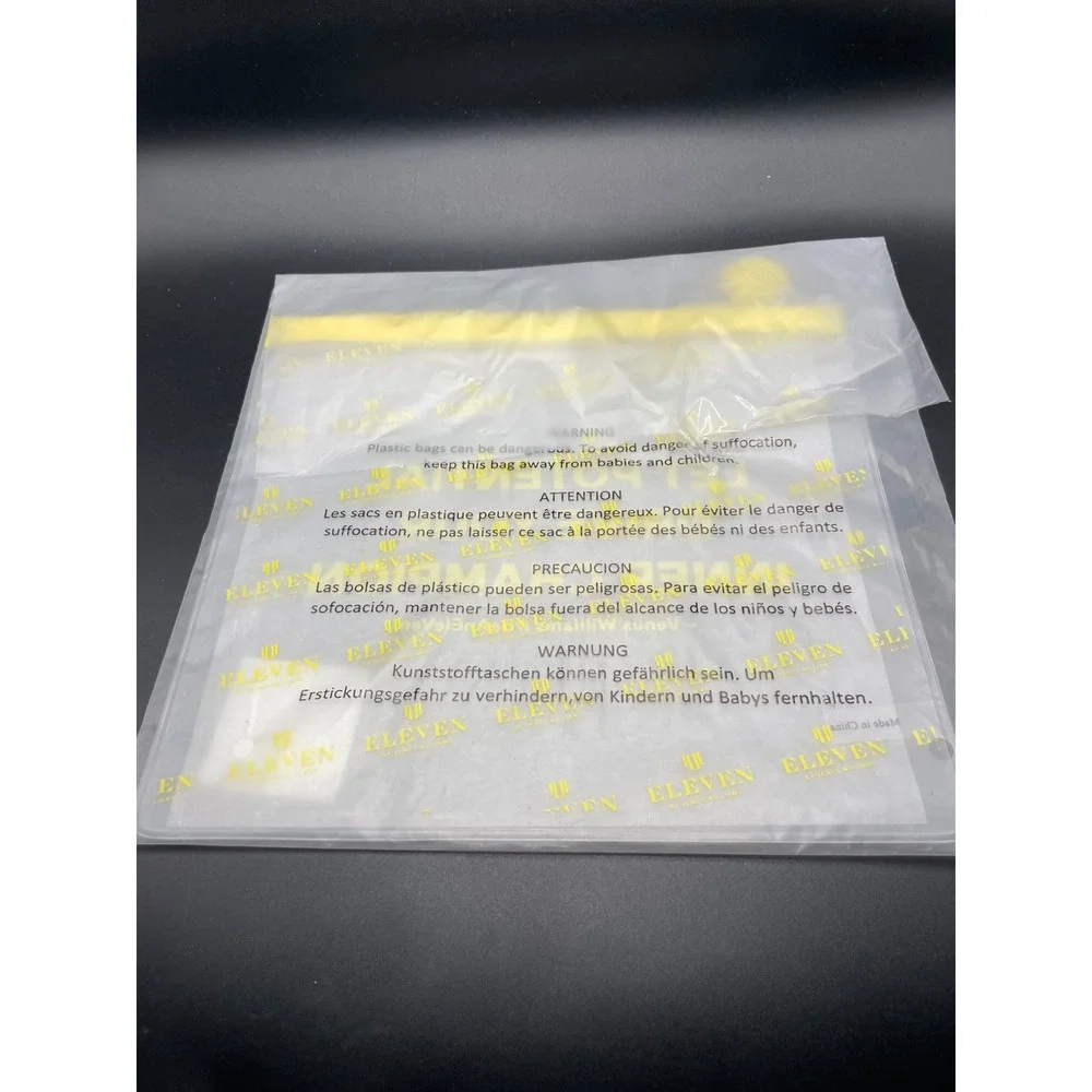 EleVen by Venus Williams Travel Pouch Clear Yellow Potential Graphic EBV-CP
